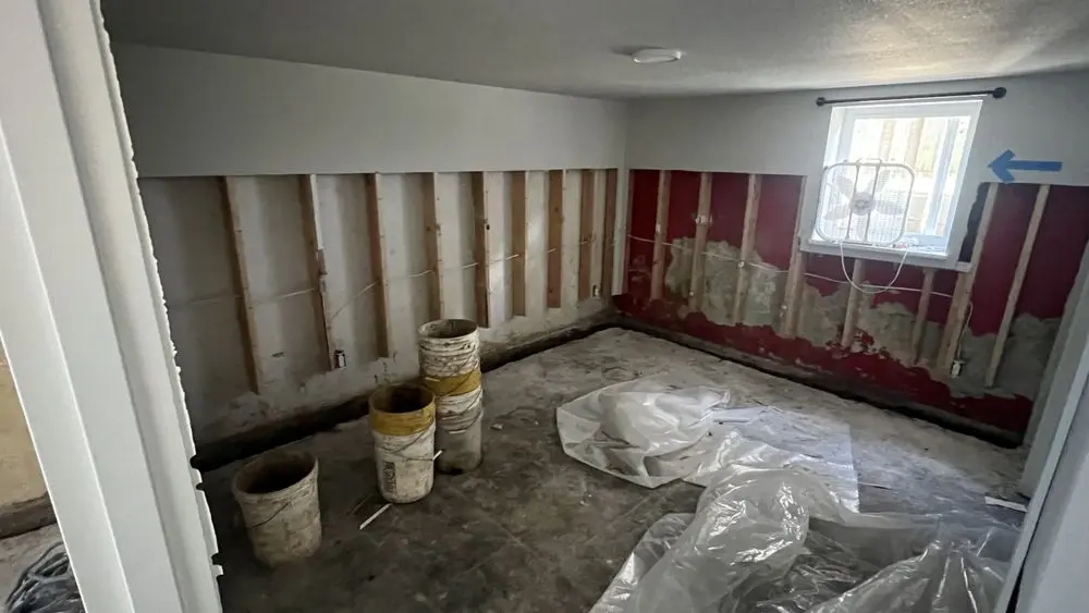 Before: Basement flood restoration